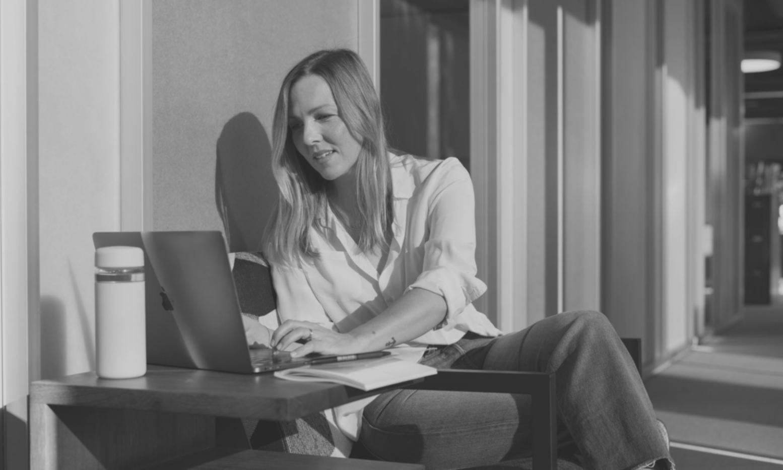 Team collaboration workspace with financial documents and learning materials